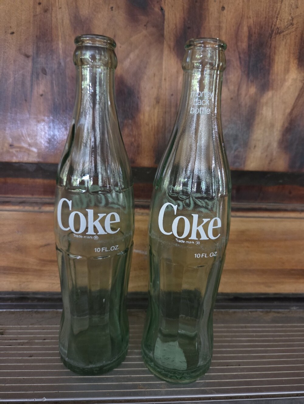 Pair Of Vintage Coca-Cola GreeGlass Hobbleskirt 10 Oz Bottles